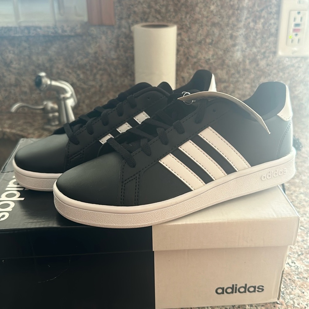 Black and white Adidas sneakers for boys